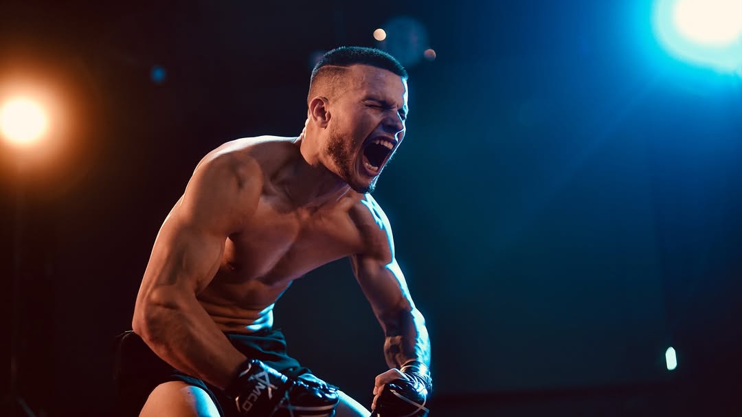Coach Hamza Khan celebrating during an MMA fight
